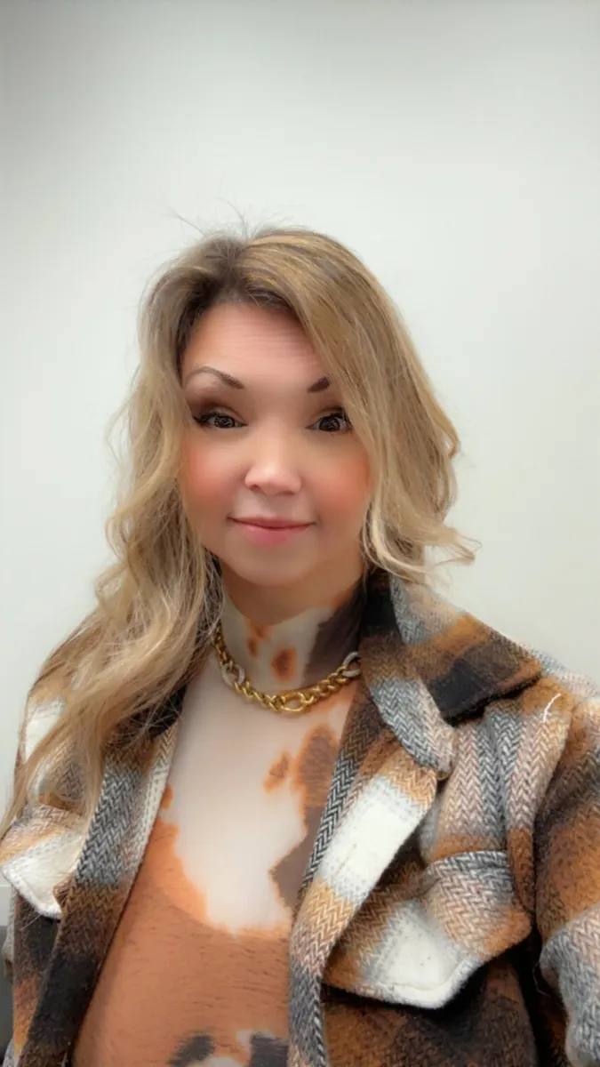 Danielle Lemons in a plaid plaid jacket, closed-mouth smile. Danielle Lemons, Vice President of Operations at DirecTech Connect, in the same plaid plaid jacket with a closed-mouth smile.